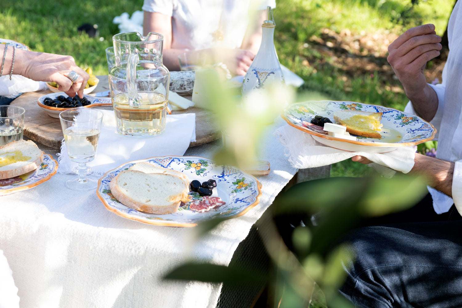 table olives aperitivo appetizers plates ceramics artisan countryside olive grove