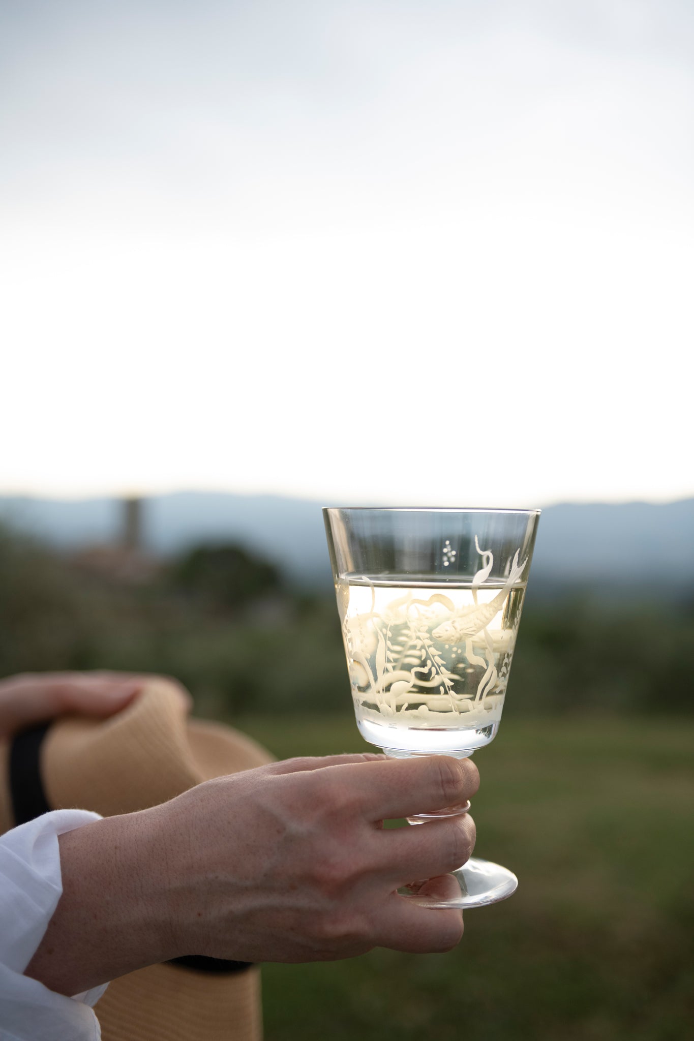 Tuscany-hand-glass-white-whine
